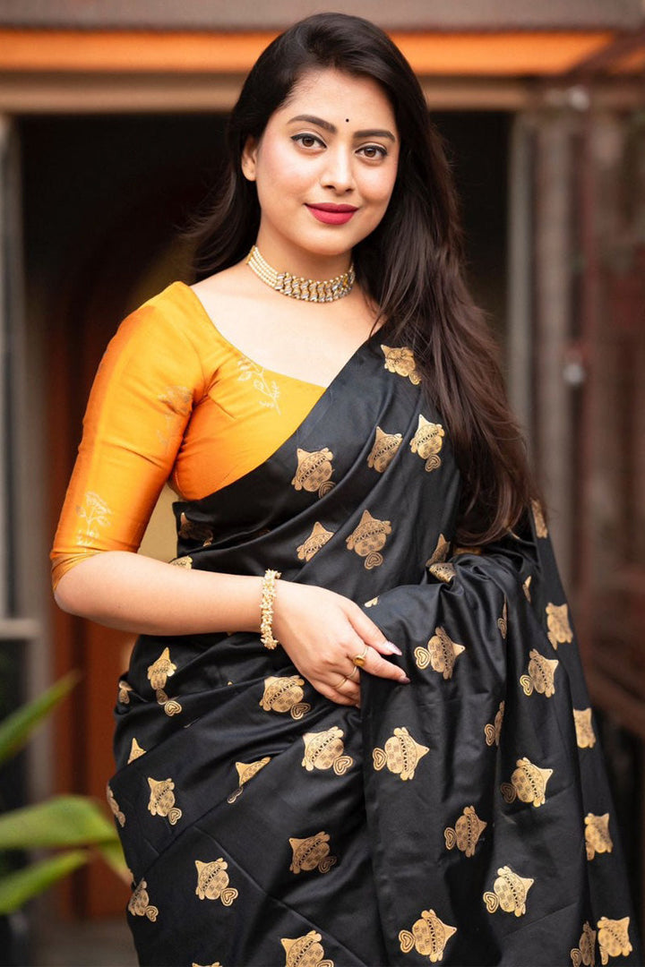 Winsome Black and Mustard Soft Silk Saree With Seraglio Blouse Piece