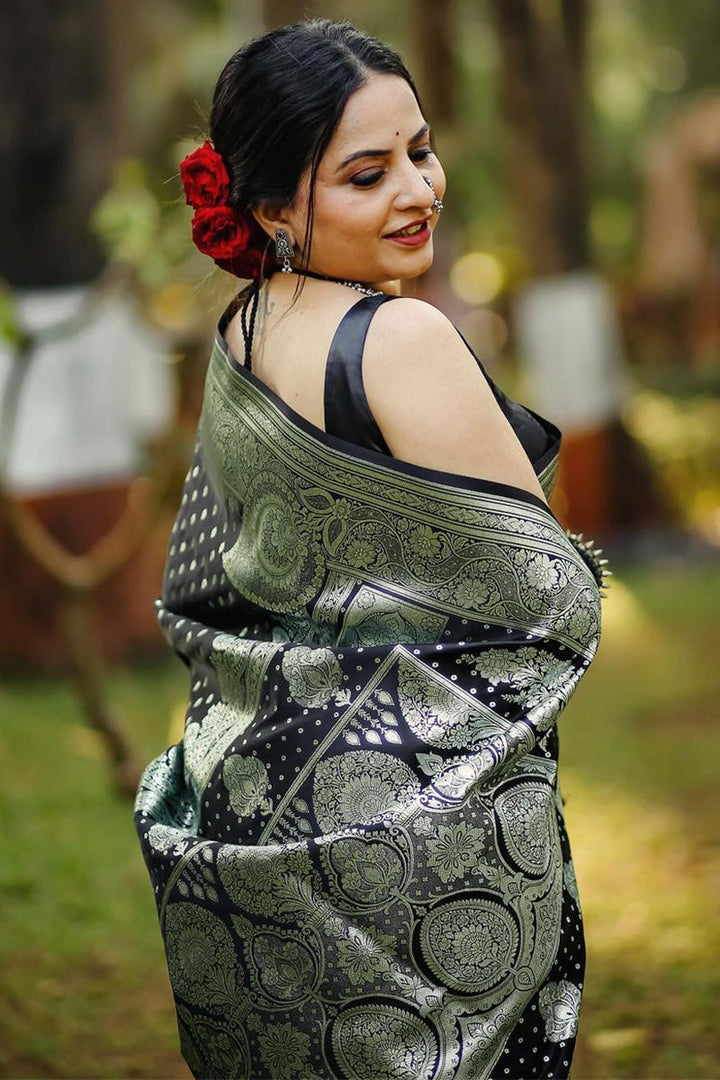 Mesmeric Black Soft Silk Saree With Breathtaking Blouse Piece