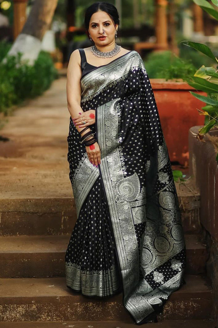 Mesmeric Black Soft Silk Saree With Breathtaking Blouse Piece