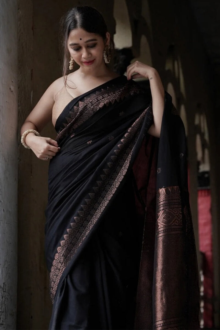 Energetic Black Soft Silk Saree With Delightful Blouse Piece