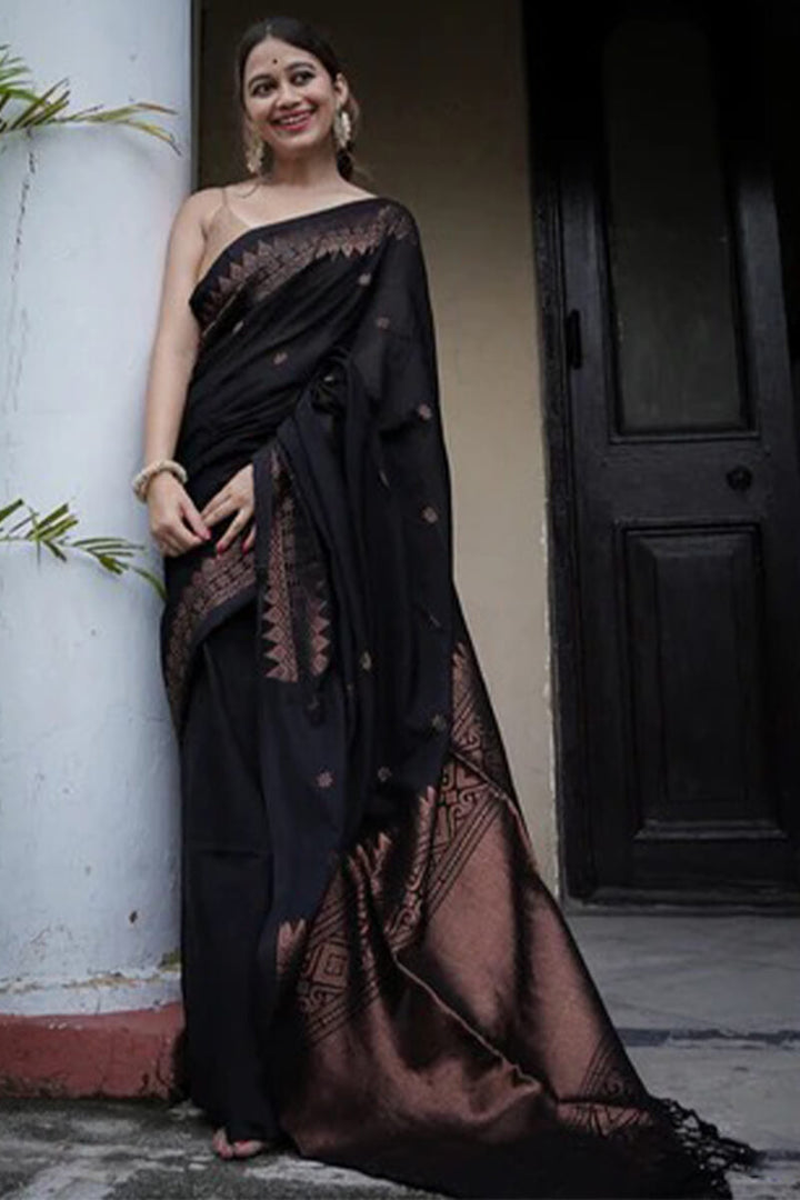 Energetic Black Soft Silk Saree With Delightful Blouse Piece