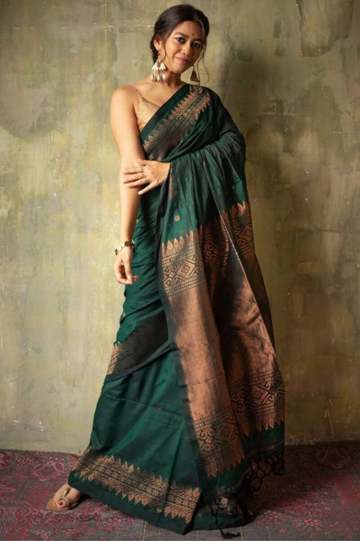 Opulent Dark Green Soft Silk Saree With Flameboyant Blouse Piece