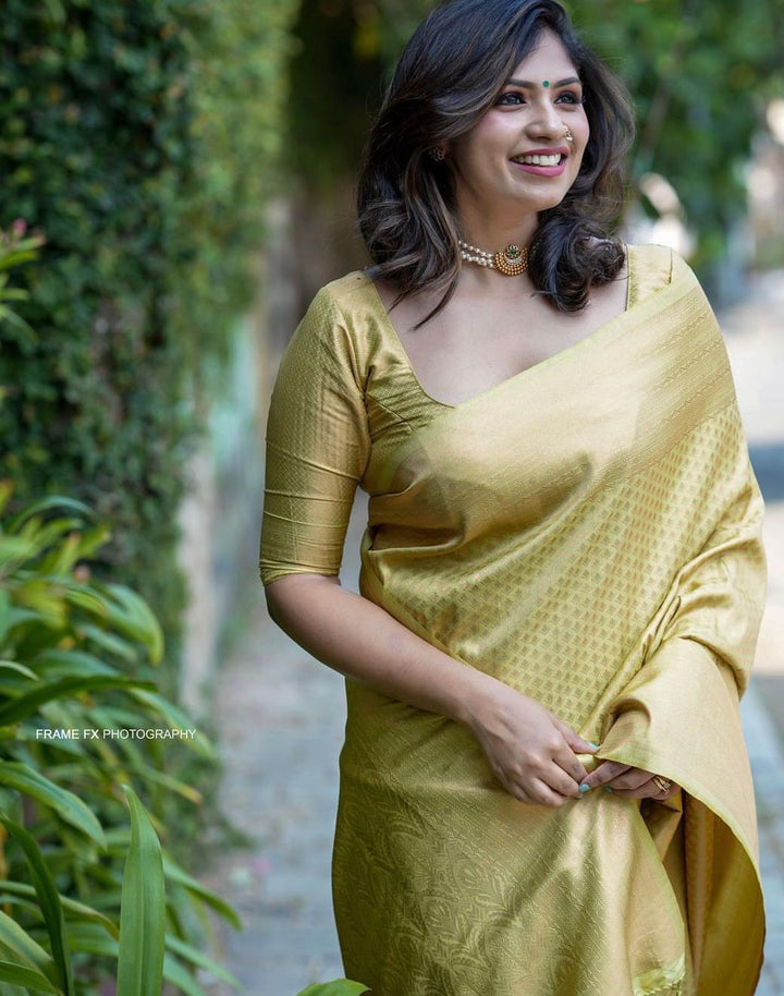 Eye-catching Yellow Soft Silk Saree With Blooming Blouse Piece