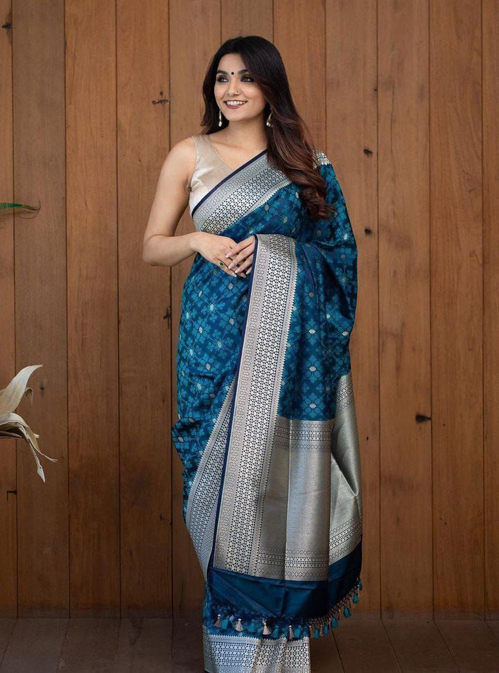 Diaphanous Teal Blue Soft Silk Saree With Elision Blouse Piece