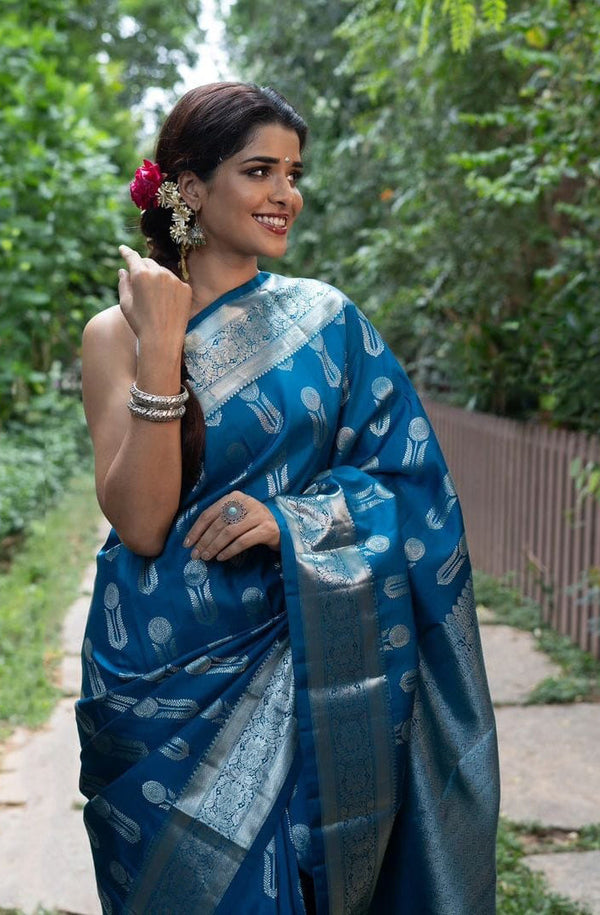 Ornate Blue Soft Silk Saree With Denouement Blouse Piece