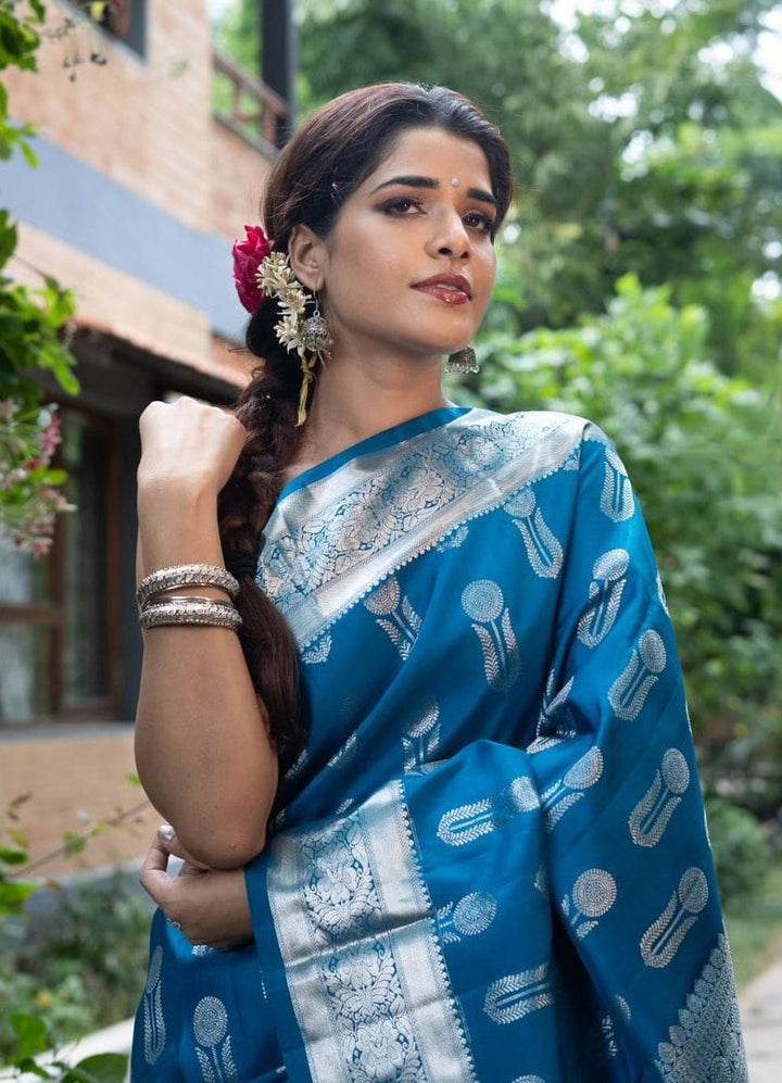 Ornate Blue Soft Silk Saree With Denouement Blouse Piece