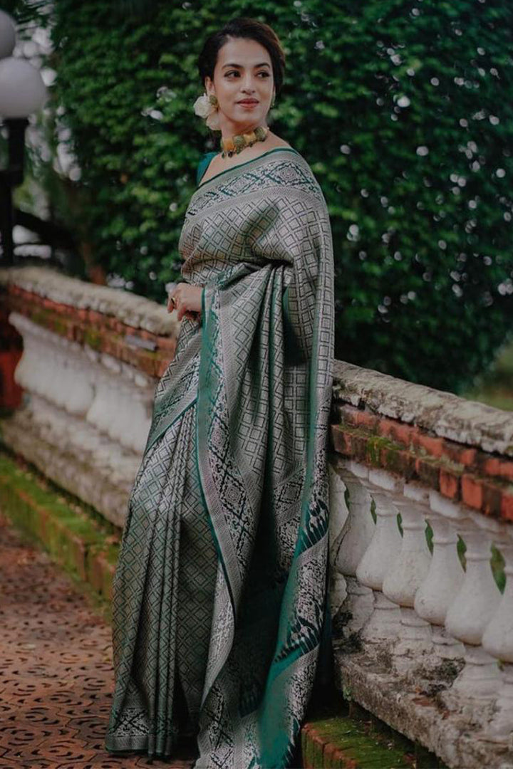 Fragrant Green Soft Silk Saree With Profuse Blouse Piece