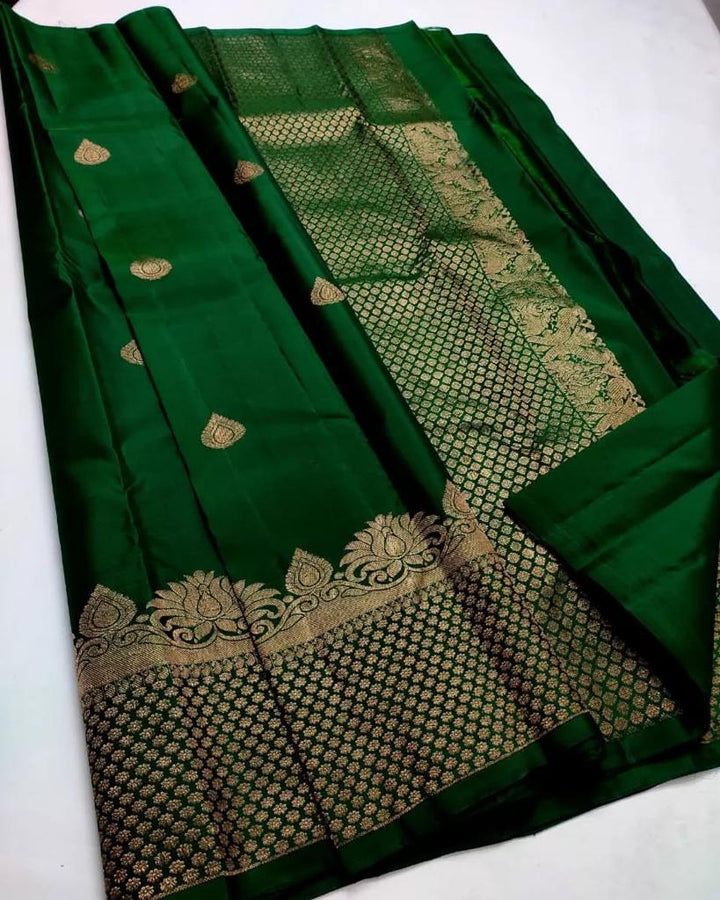 Symmetrical Dark Green Soft Silk Saree With Susurrous Blouse Piece