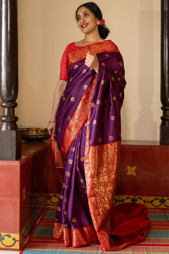 Ethnic Purple Soft Silk Saree With Delightful Blouse Piece