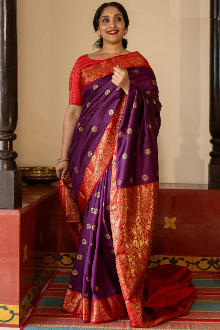 Ethnic Purple Soft Silk Saree With Delightful Blouse Piece