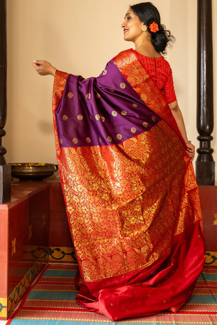 Ethnic Purple Soft Silk Saree With Delightful Blouse Piece