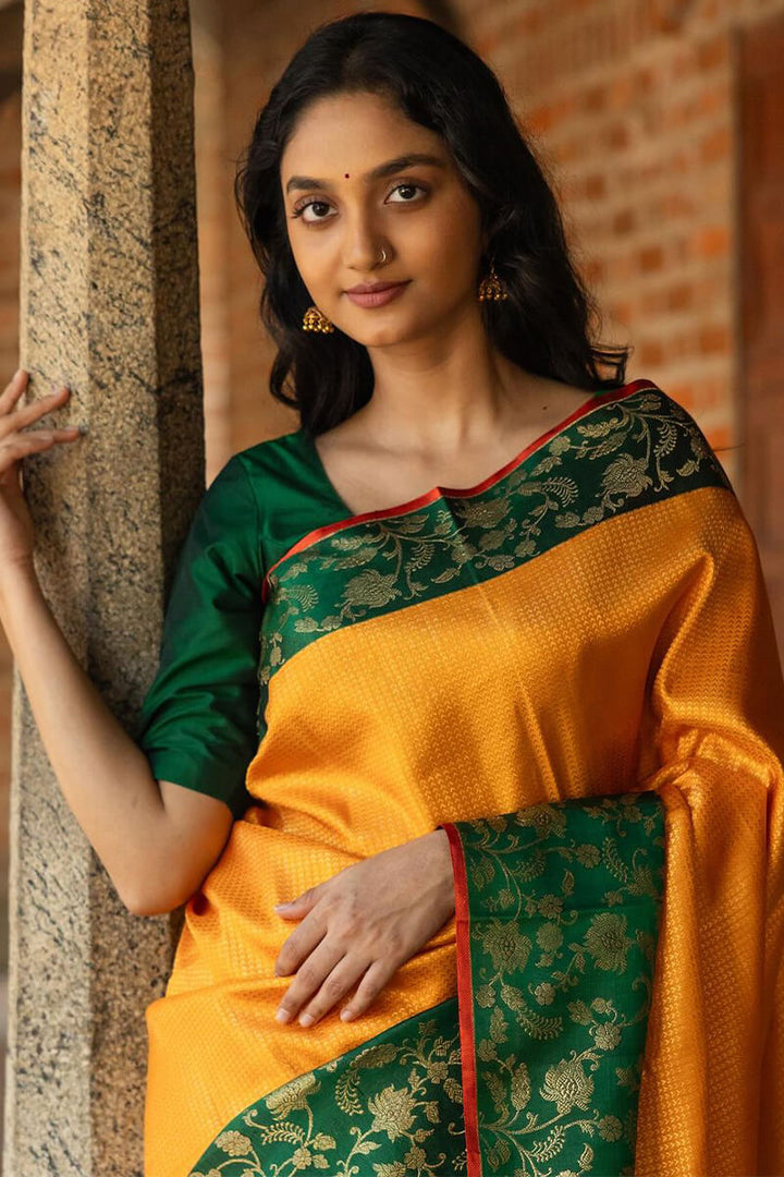 Outstanding Yellow Soft Silk Saree With Flattering Blouse Piece