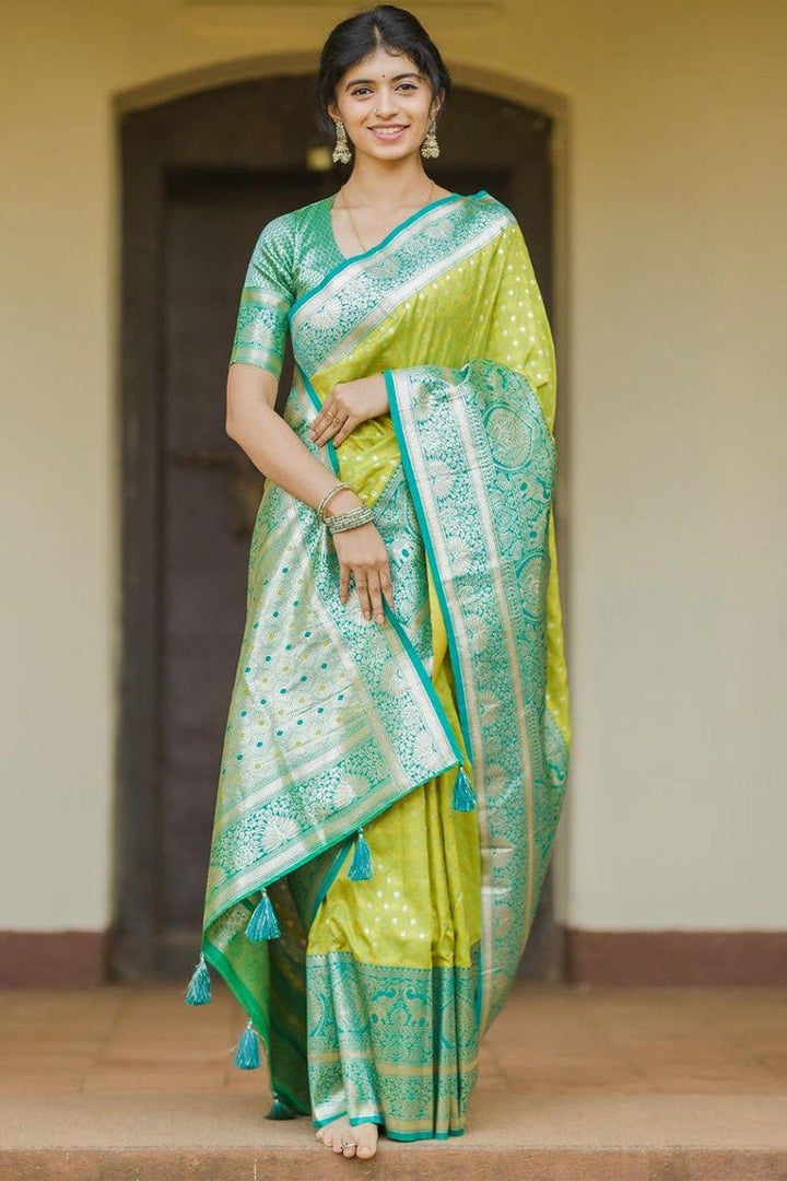 Gratifying Parrot Soft Silk Saree With Elegant Blouse Piece