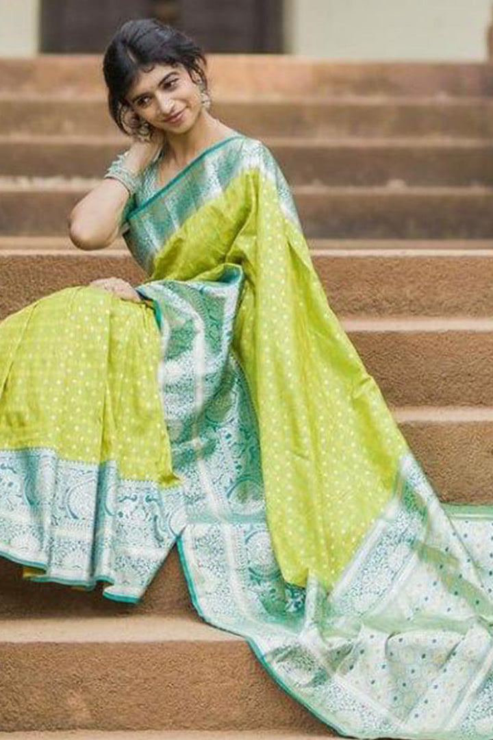 Gratifying Parrot Soft Silk Saree With Elegant Blouse Piece