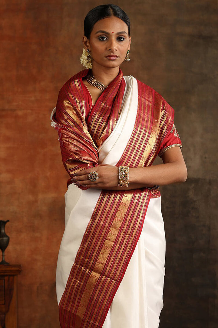 Magnetic Off White Soft Silk Saree With Luxuriant Blouse Piece