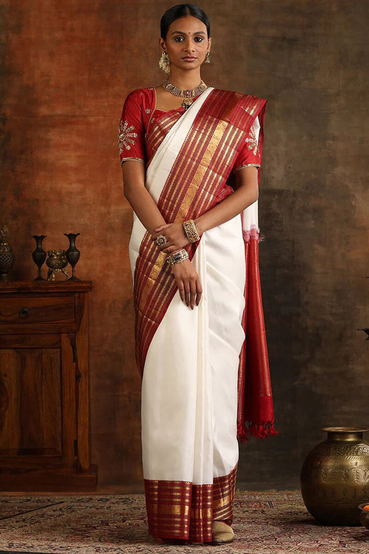 Magnetic Off White Soft Silk Saree With Luxuriant Blouse Piece