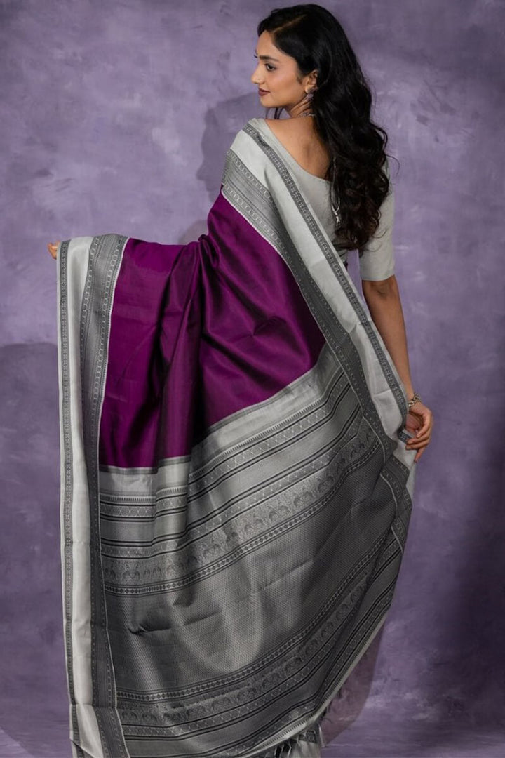 Supernal Wine Soft Silk Saree With Enigmatic Blouse Piece