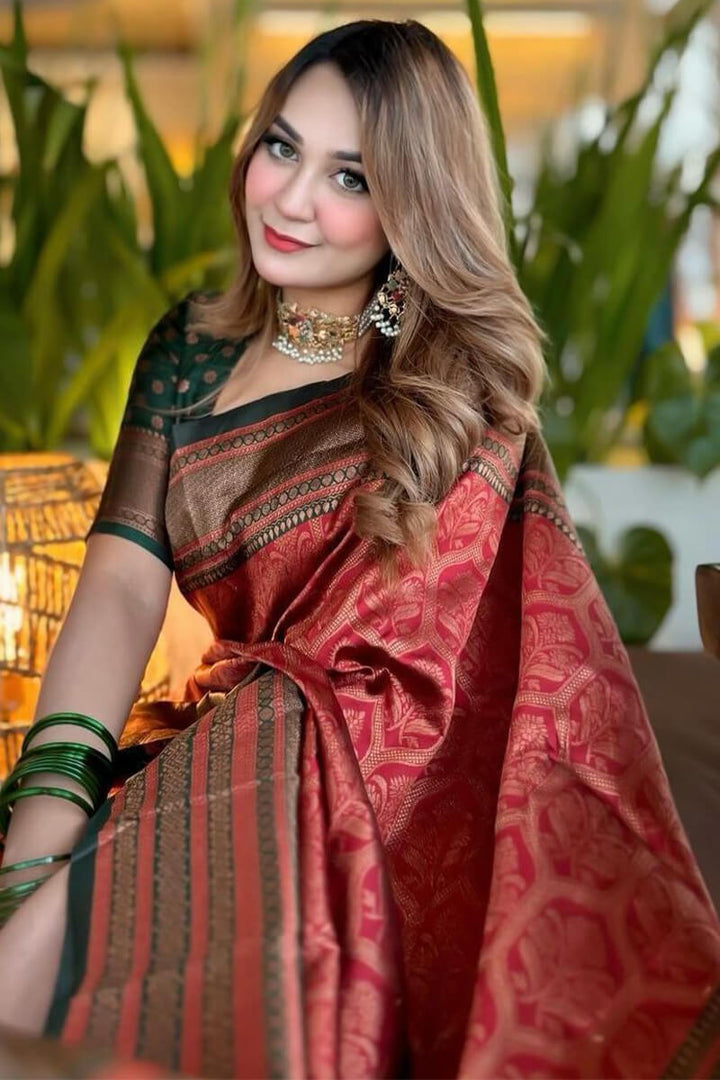 Eloquence Maroon Soft Silk Saree With Flamboyant Blouse Piece