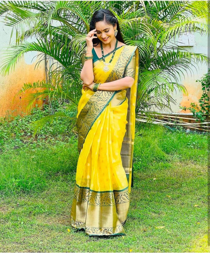 Glorious Yellow Soft Silk Saree With Adorable Blouse Piece