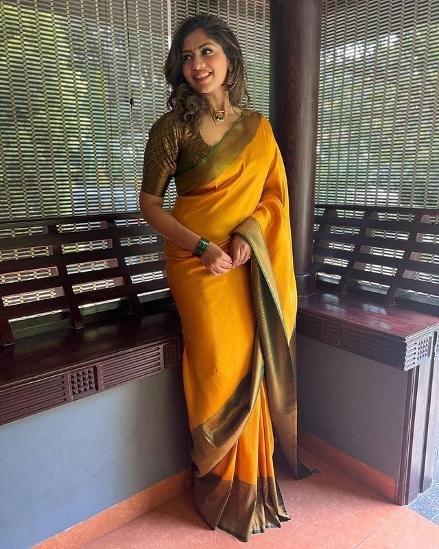 Dazzling Yellow Soft Silk Saree with Beautiful Blouse Piece