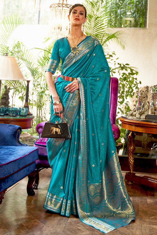 Engaging Firozi Kanjivaram Silk Saree With Woebegone Blouse Piece