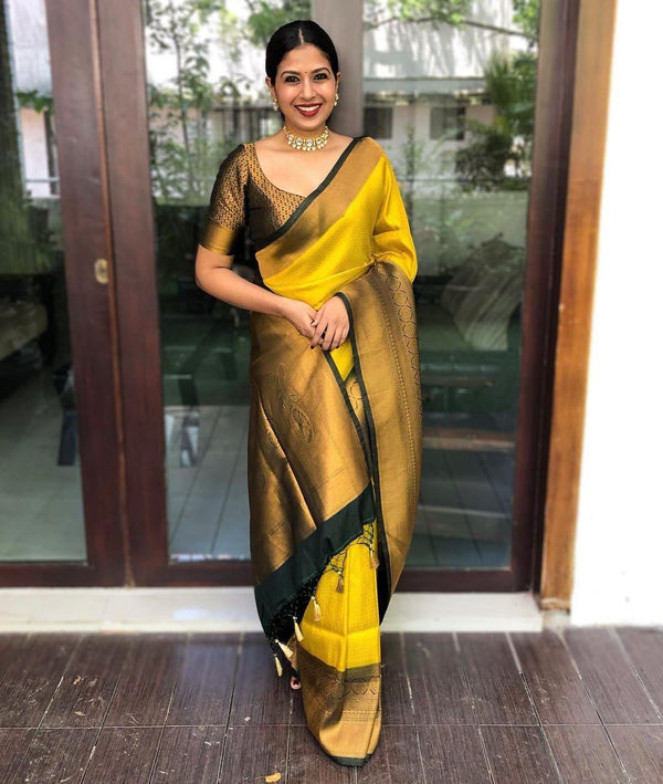 Moiety yellow Soft Banarasi Silk Saree With Panoply Blouse Piece