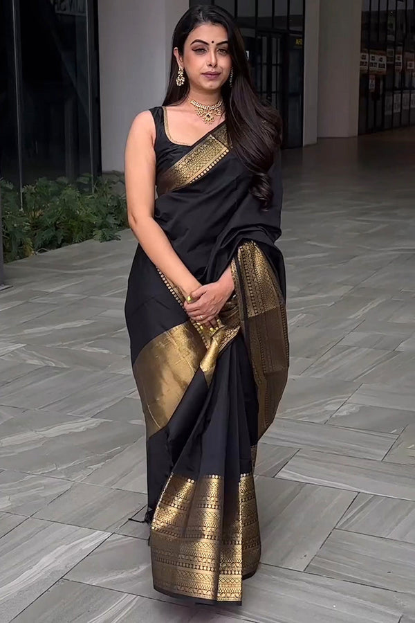 Appealing Black Soft Silk Saree With Prominent Blouse Piece