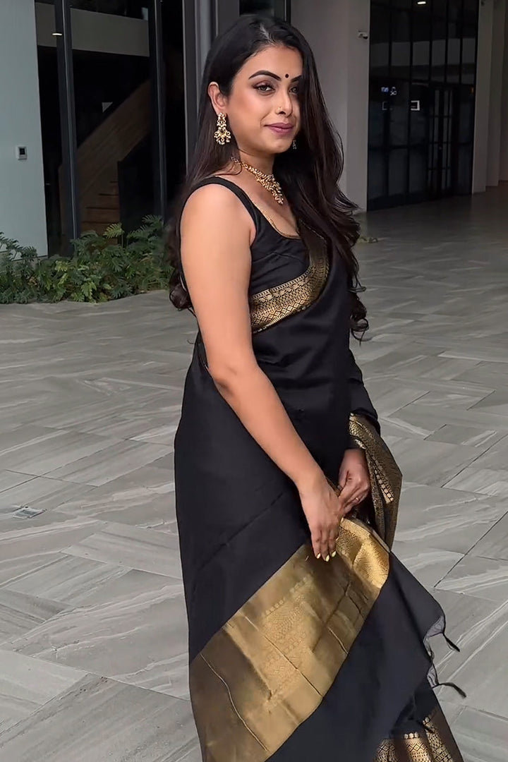 Appealing Black Soft Silk Saree With Prominent Blouse Piece