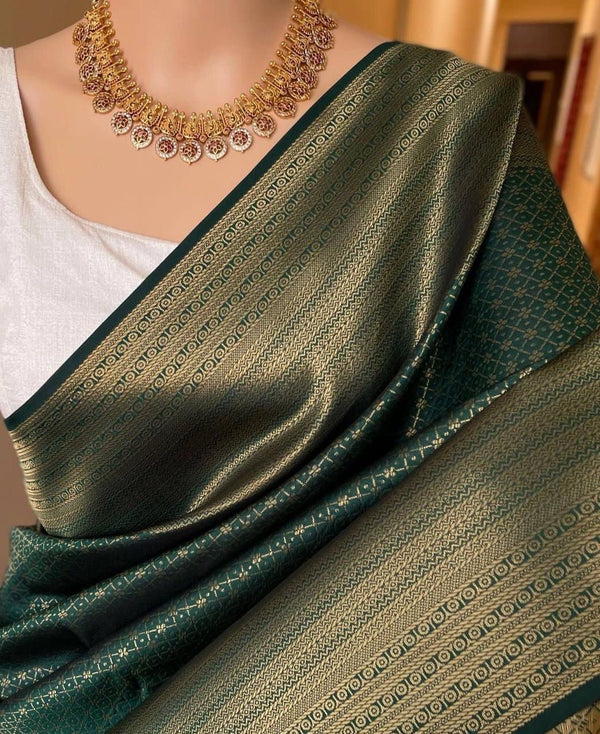 Gorgeous Dark Green Soft Silk Saree With Alluring Blouse Piece