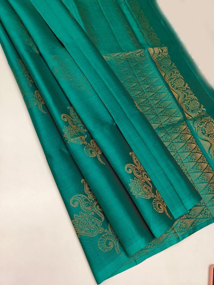 Traditional Firozi Soft Silk Saree With Exemplary Blouse Piece