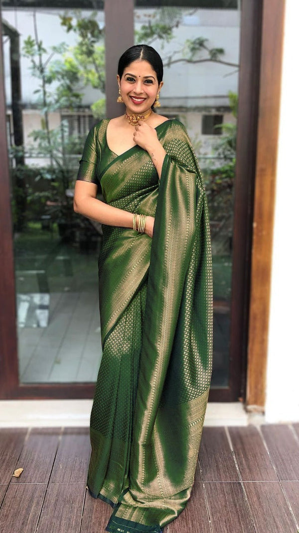 Flamboyant Green Soft Silk Saree With Gleaming Blouse Piece