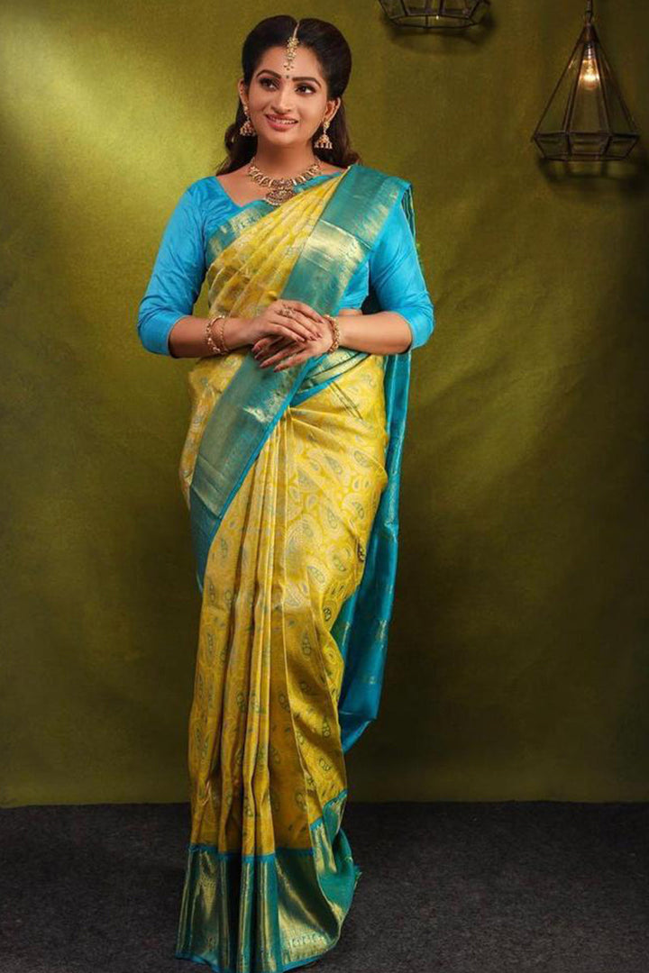 Delightful Yellow Soft Silk Saree With Engrossing Blouse Piece