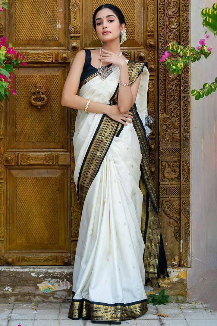 Surpassing Off White Soft Silk Saree With Flameboyant Blouse Piece