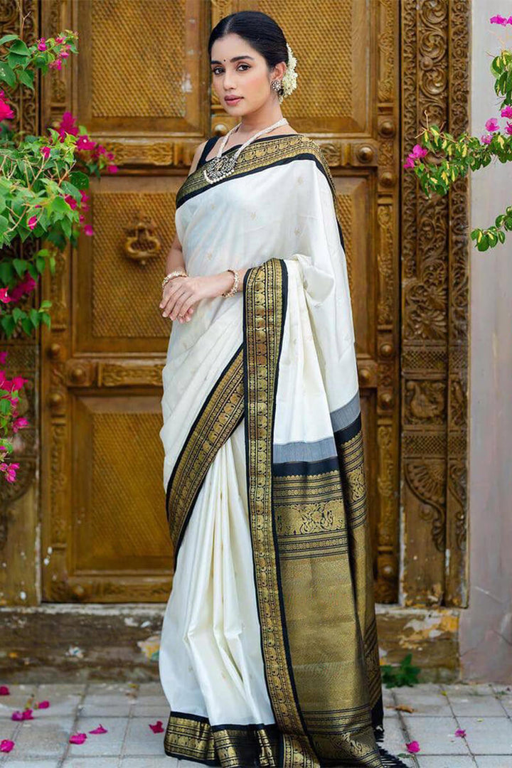 Surpassing Off White Soft Silk Saree With Flameboyant Blouse Piece