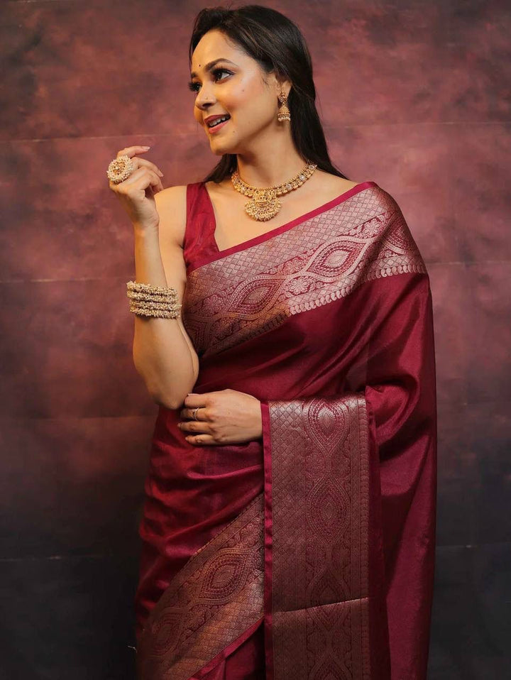 Engrossing Maroon Soft Silk Saree With Inspiring Blouse Piece