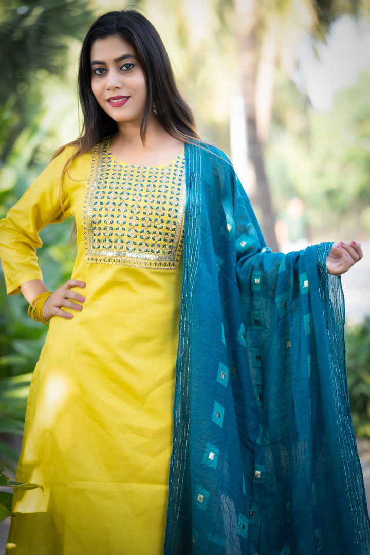 yellow embroidery work kurta set