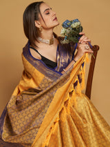 designer soft silk aura base with contras blouse and pallu.